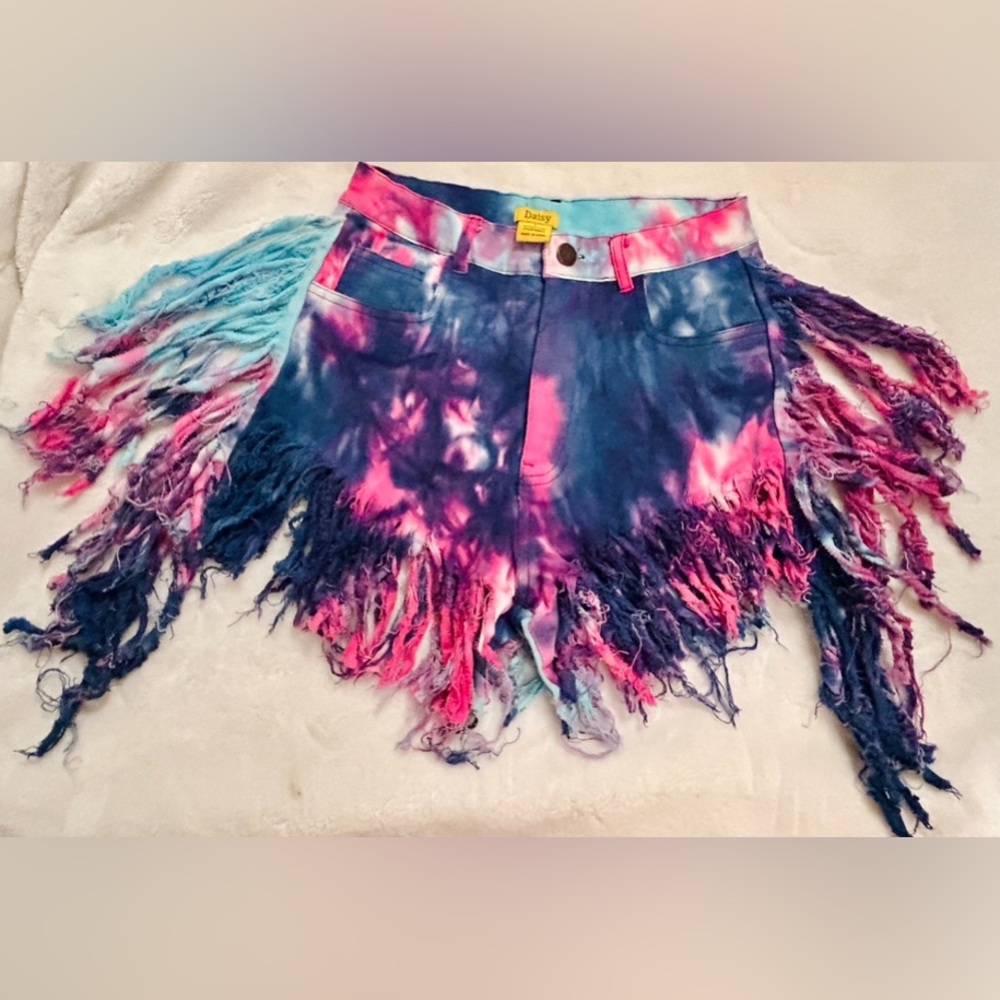 Fringed tie dye denim shorts. Absolutely adorable and fun!💜❤️🩵❤️